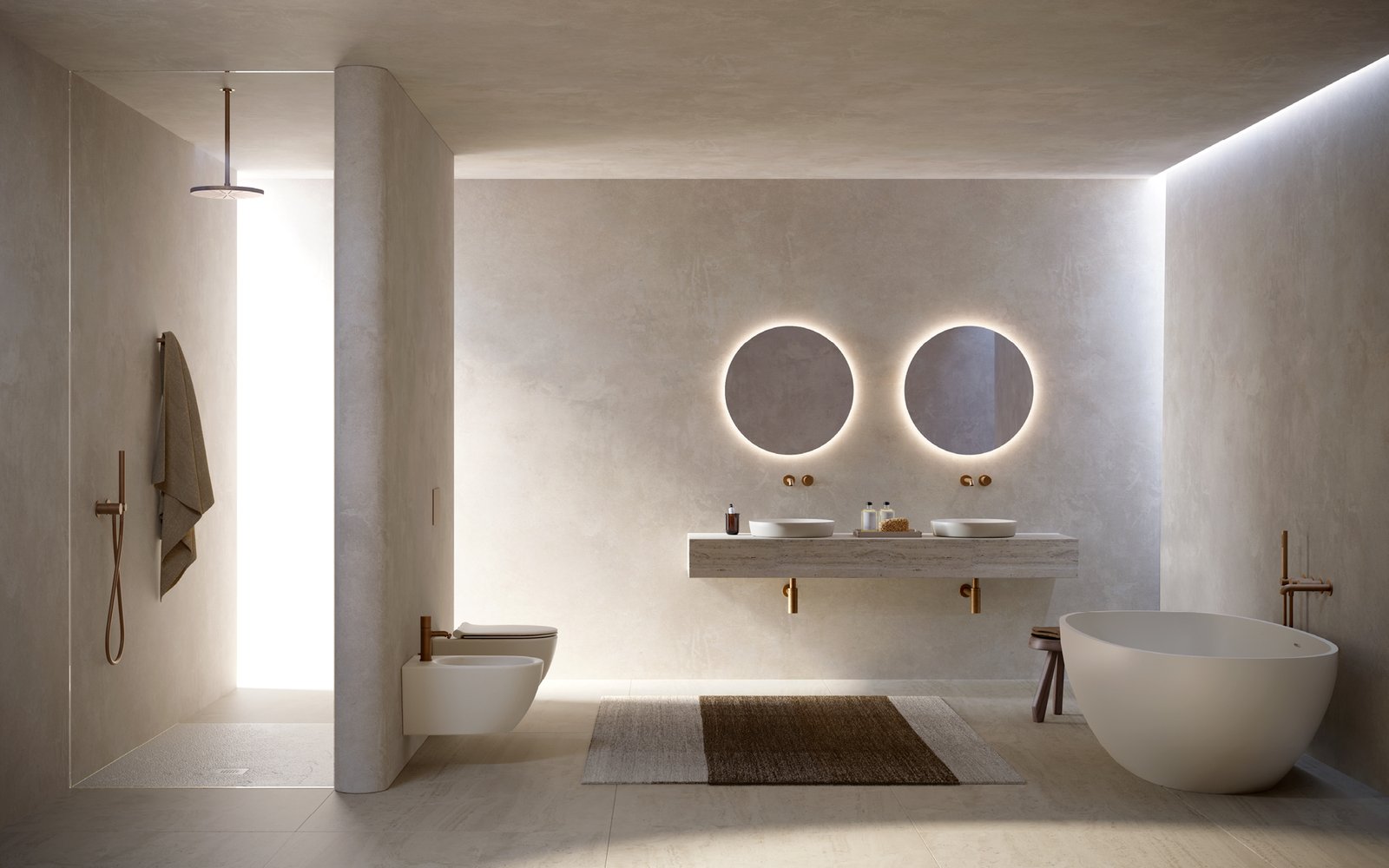 Travertine-plaster luxury bathroom scheme — Catalano Lino sanitaryware, double basin on a stone vanity, brushed brass brassware, walk-in shower with overhead rainfall, ceramic freestanding bath, integrated cove lighting — the kind of materials and finish coordination a designer assembles before any product is ordered