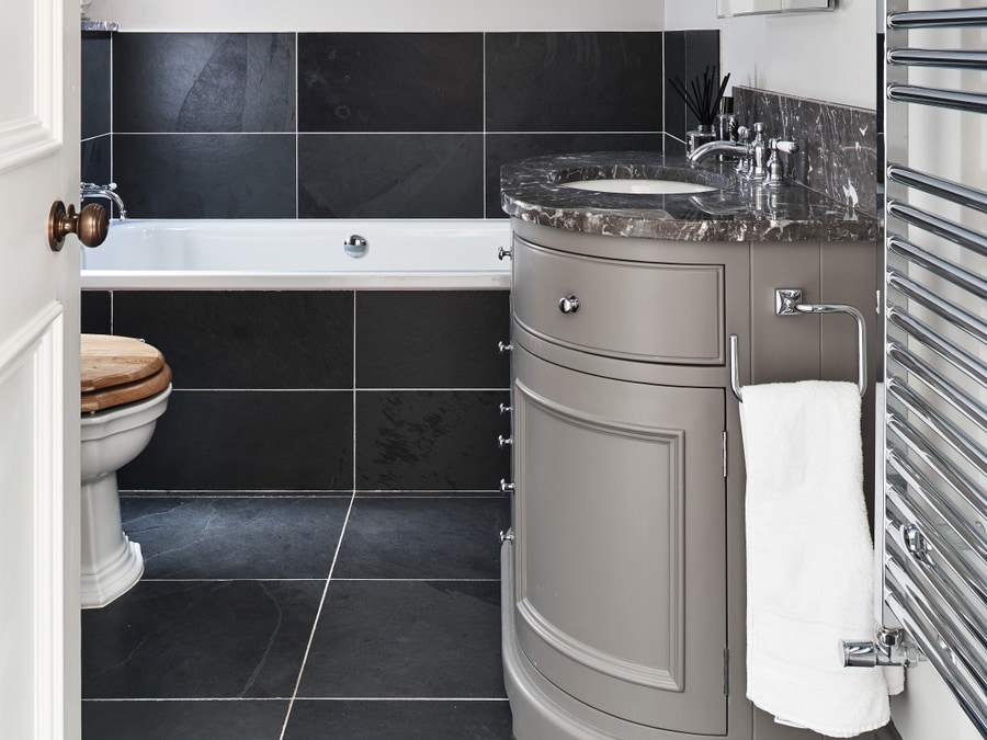 Ca Pietra Metropolitan Slate in a riven natural finish — the textured surface clears R11 underfoot, suitable for wet-zone shower floors and wetrooms in luxury bathrooms