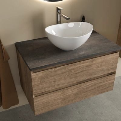 Calypso vanity finish options display showing painted and wood finishes at Bowman Bathrooms