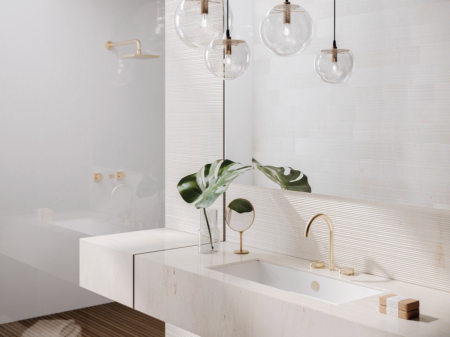 Compressed luxury bathroom scheme - Catalano Zero compact basin in white, stock-finish brassware, porcelain tile