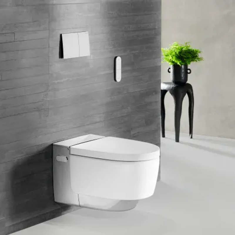Geberit AquaClean smart WC in a luxury bathroom — Approved Document G water-efficient flush mechanism, integrated bidet wash, full UK compliance from a single specification supplier