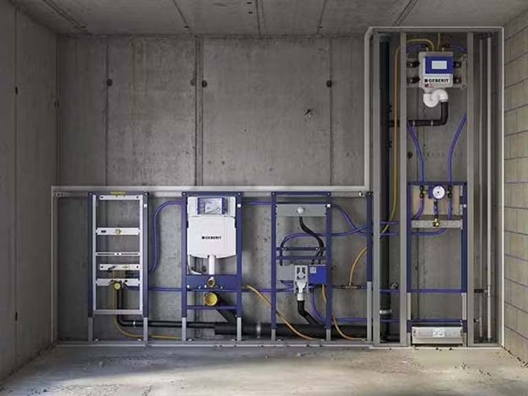 Geberit concealed cistern and wall-hung toilet installation - premium Swiss bathroom technology at Bowmans Essex showroom