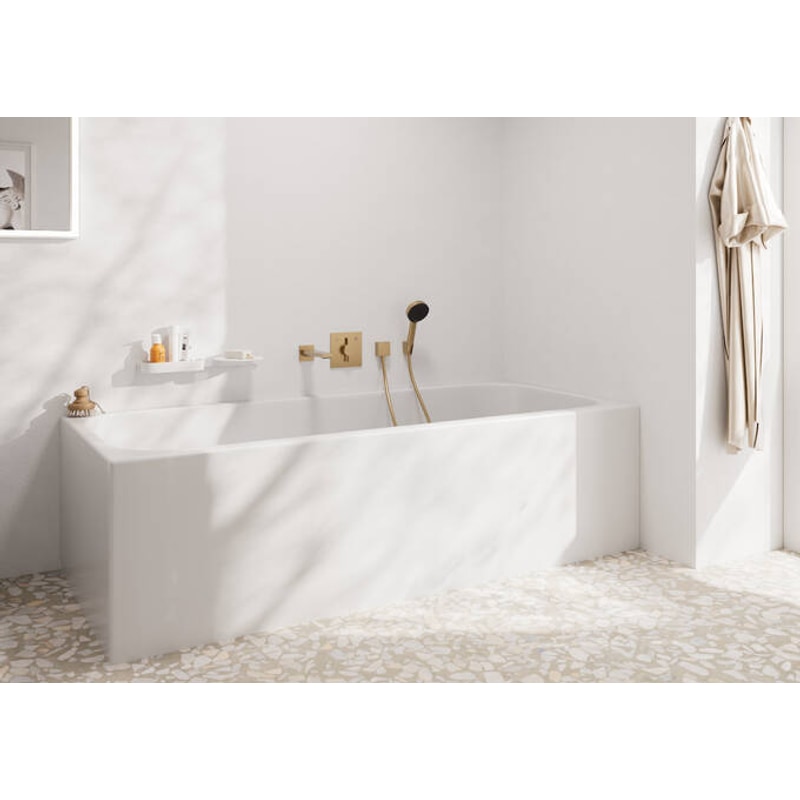 Hansgrohe thermostatic shower controls — TMV-compliant temperature limiting that meets Approved Document G hot-water safety, mounted within Zone 2 of a luxury walk-in shower per BS 7671 Amendment 3:2024 zoning