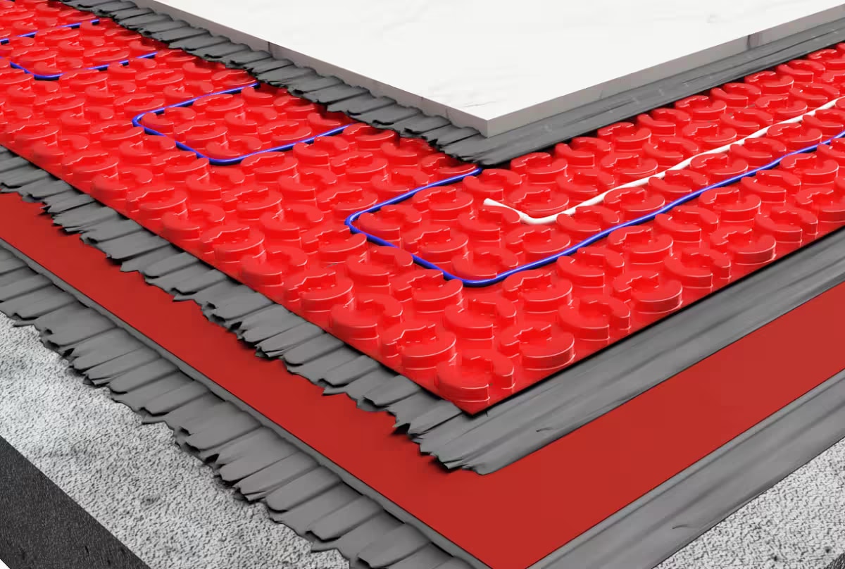 Warmup insulation board substrate ready for electric underfloor heating cable in a UK bathroom retrofit - tile-backer insulation reduces downward heat loss, cuts warm-up time and lowers running cost without changing system choice
