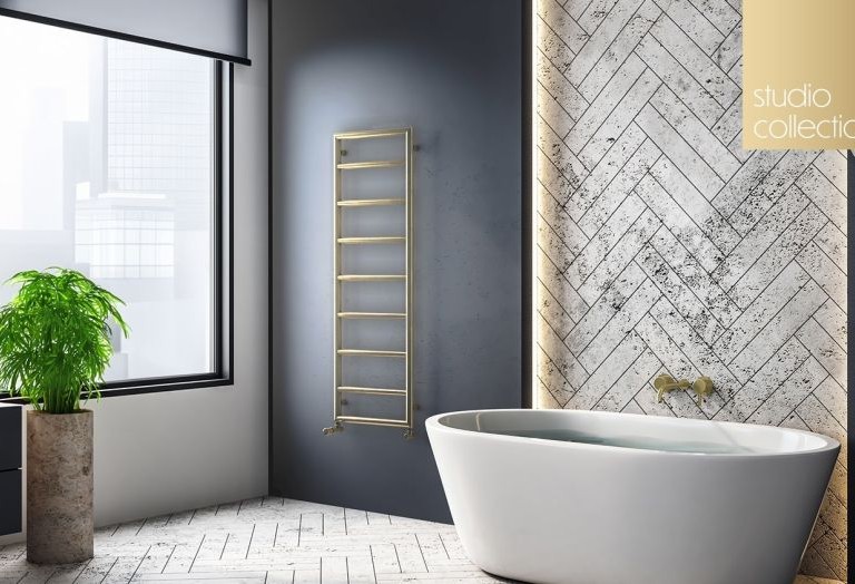 Zehnder Pera radiator in brushed brass, luxury Essex bathroom
