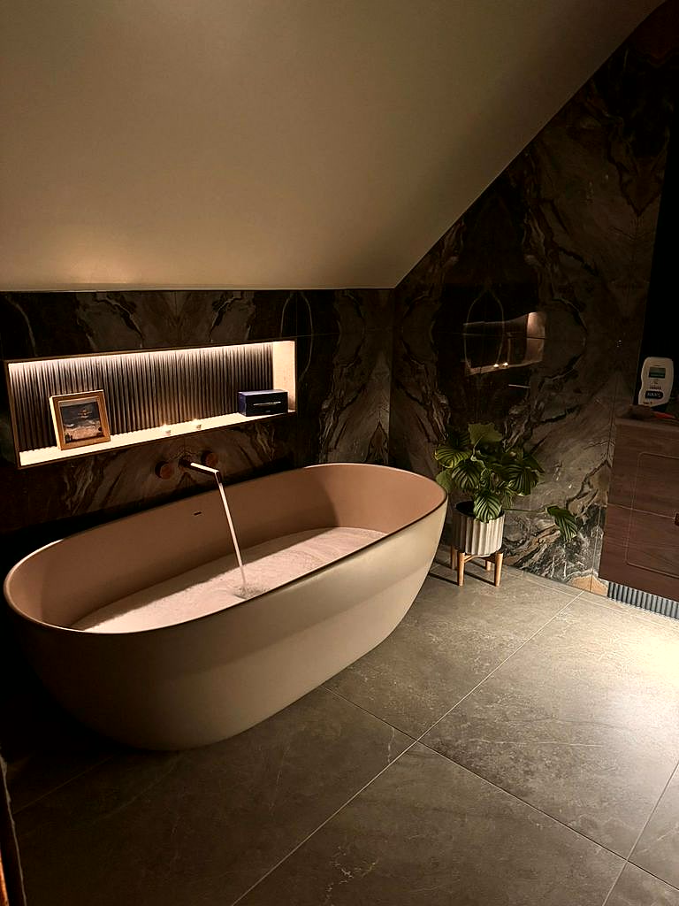 Luxury West Mersea ensuite bathroom with freestanding bath and premium fixtures in Essex