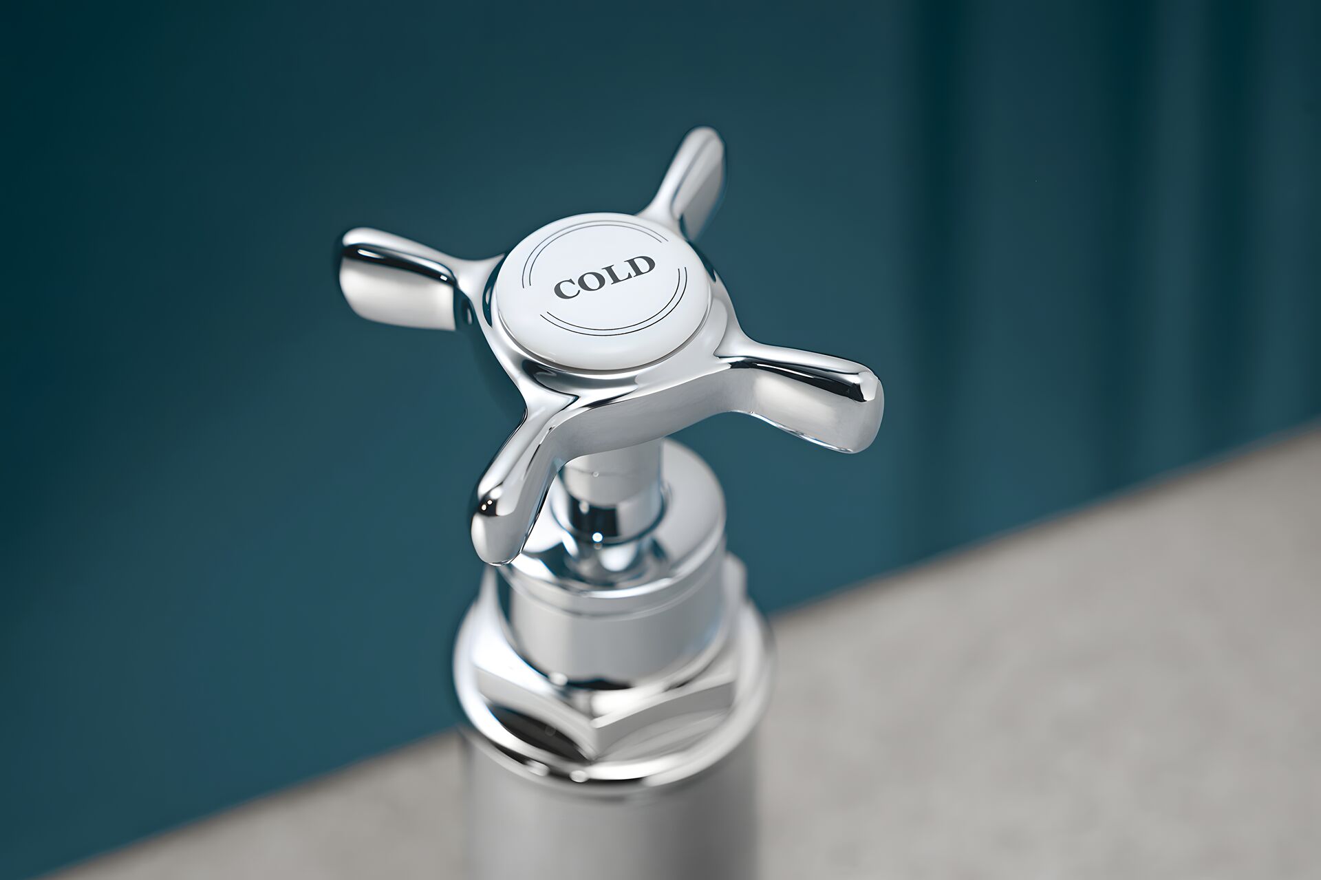 Chrome AXOR Montreux cross handle with a white porcelain COLD insert