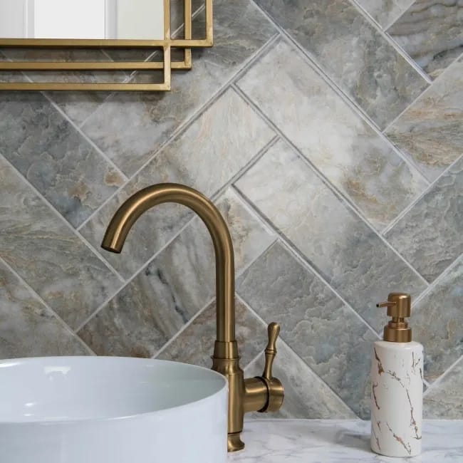 Herringbone tile pattern with straight rectangular ends creating a broken zig-zag at 90-degree angles