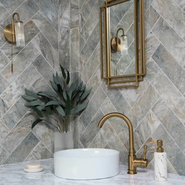 Herringbone onyx pear wall tiles creating textural feature wall in bathroom