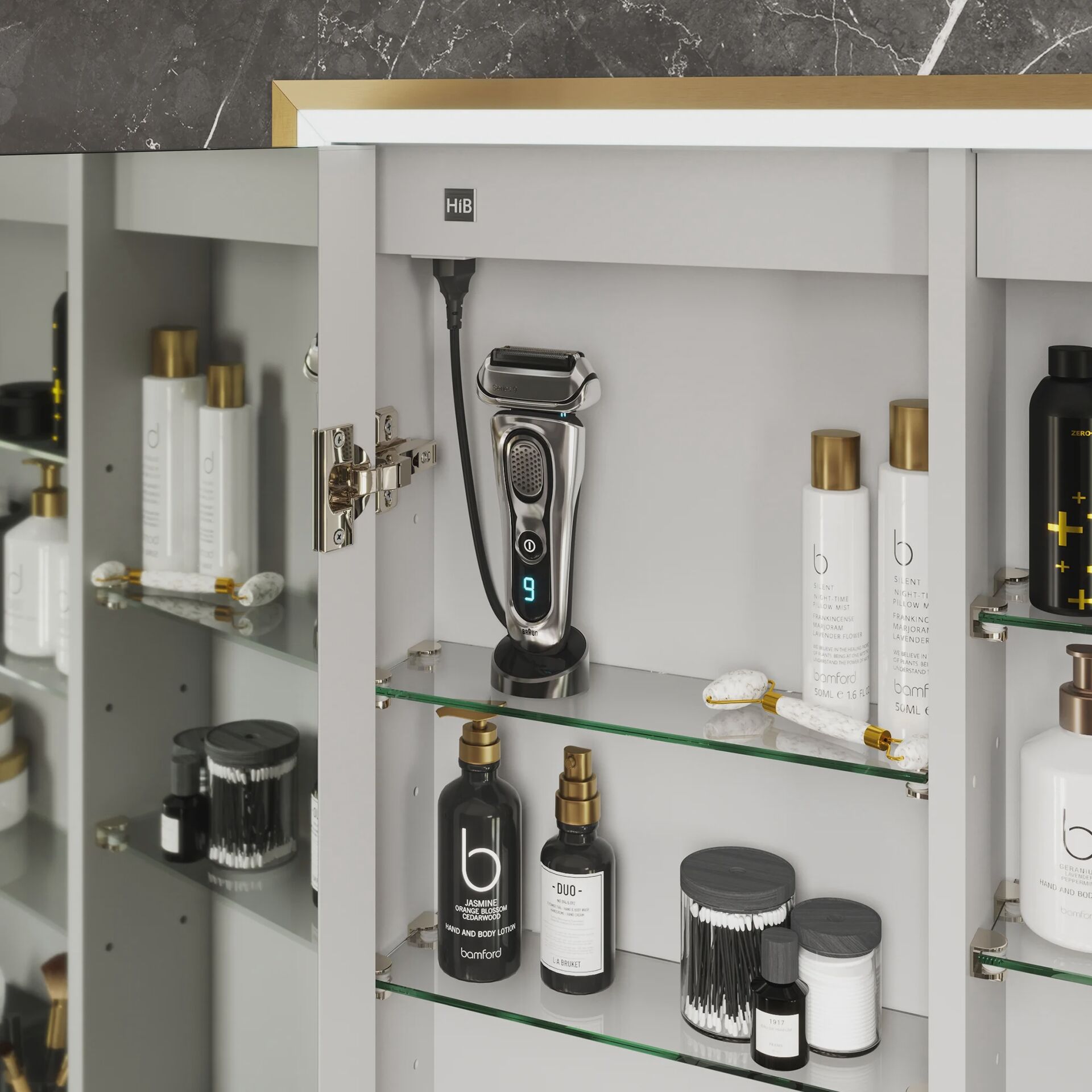 Vanquish interior detail with shaver connection and toiletries on shelves
