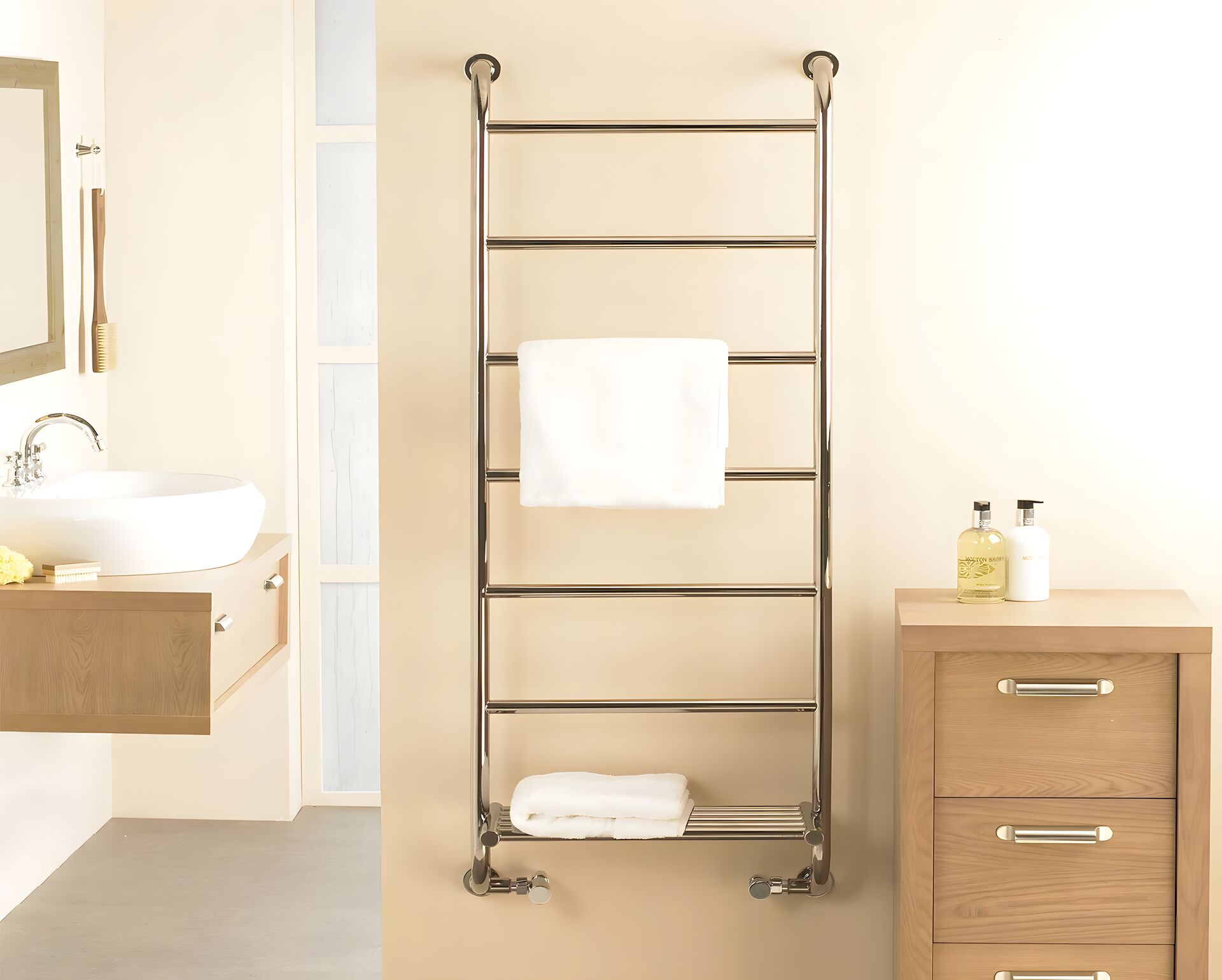 Vogue Ieri ladder-style towel radiator in a light bathroom