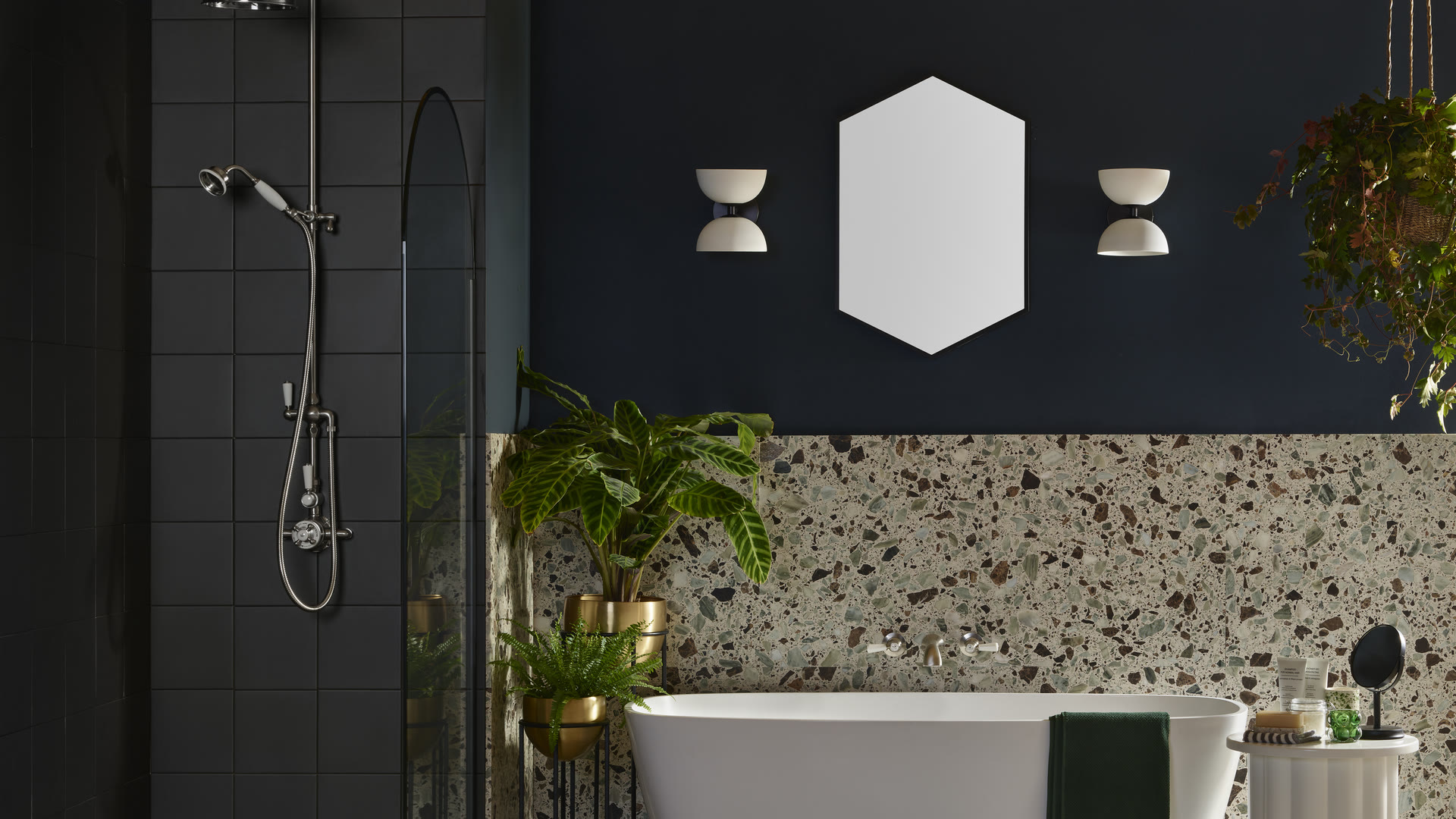 Freestanding bath and walk-in shower in a navy bathroom, the everyday choice behind replacing a bath with a walk-in shower