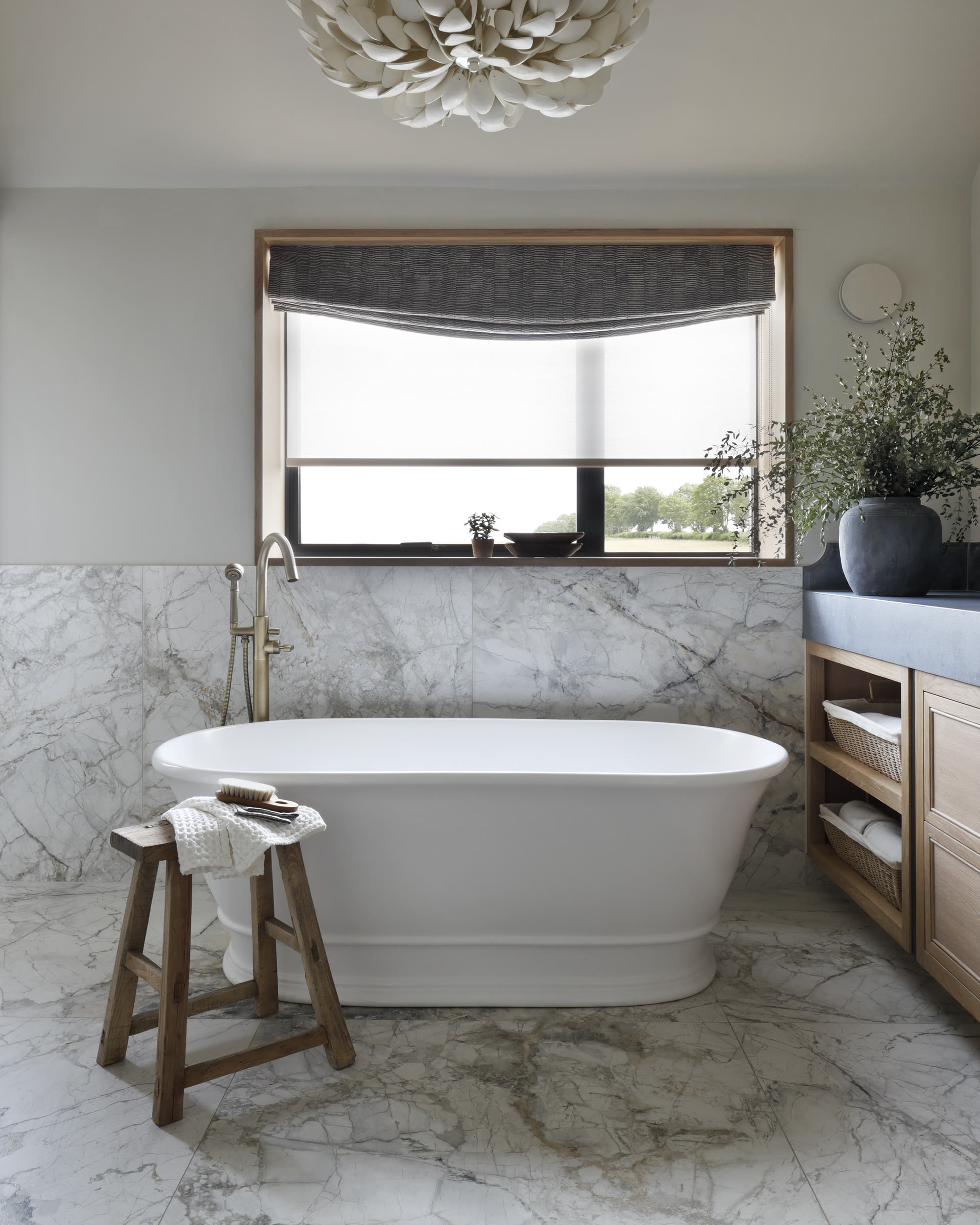 Family bathroom with BC Designs bath and mosaic tile — the young-family configuration where keeping the bath is usually right