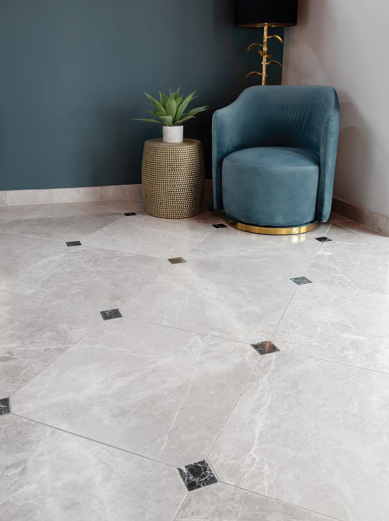 Diagonal diamond grid tile layout with honed marble tiles set at 45 degrees on bathroom floor