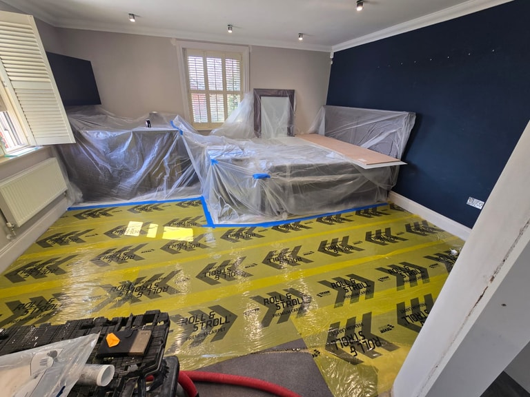Professional floor protection during luxury bathroom installation in Essex