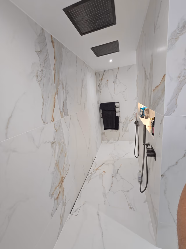 Walk-in wetroom shower with JTP Hix ceiling rainfall head and brushed black brassware in Billericay CM11