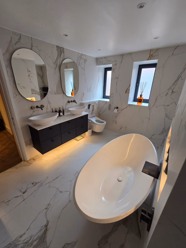 Completed Billericay CM11 master ensuite overview with BC Designs Kurv bath and Calypso vanity