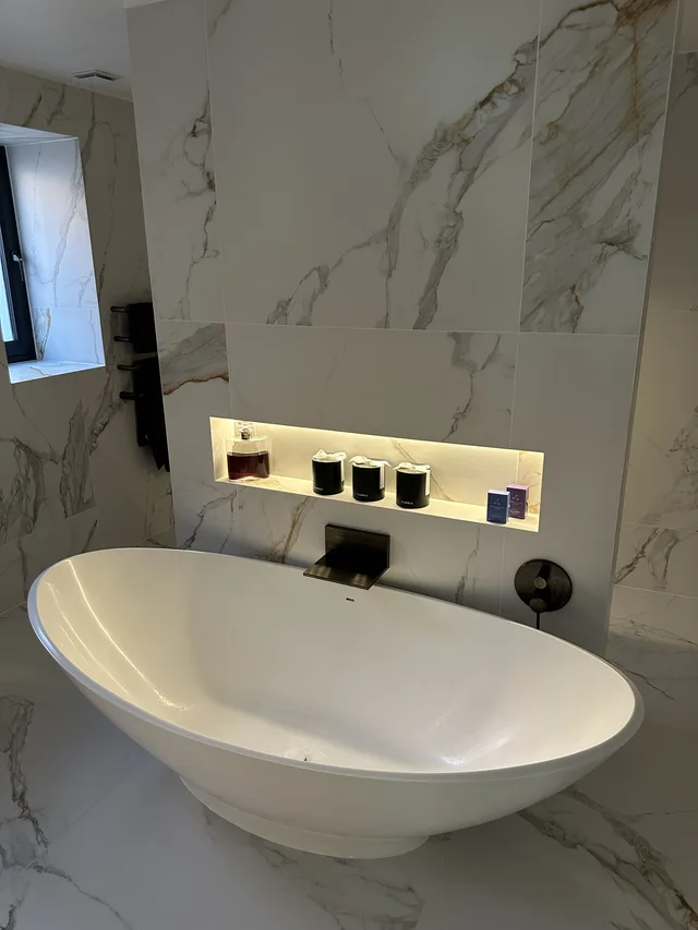 Billericay CM11 luxury master ensuite featuring washlet and freestanding bath modern wetroom design Essex Bowmans