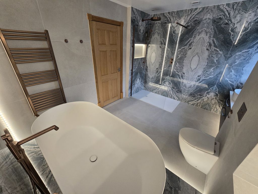 JTP Evo brushed bronze freestanding bath filler with Crosswater MPRO bath — Bradwell CM77