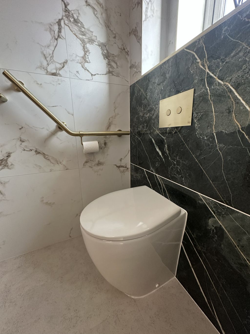WC with Crosswater grab bar and Malachite feature tile — Braintree CM7