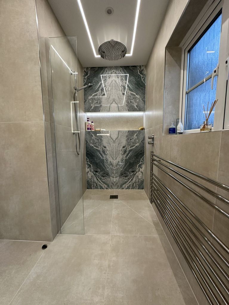 Luxury ensuite wetroom shower area — bathroom supply quality for Braintree homeowners