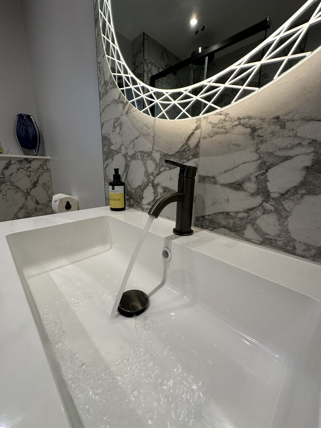 JTP KONO brushed black basin mixer tap on white basin with HiB Bellus mirror above in Bures CO8