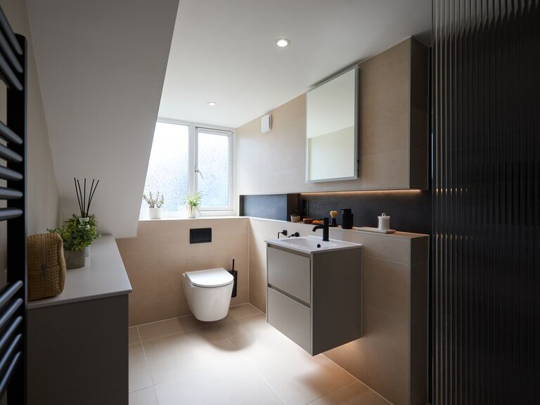 Chelmsford CM2 luxury shower room with fluted glass screen and matt black brassware