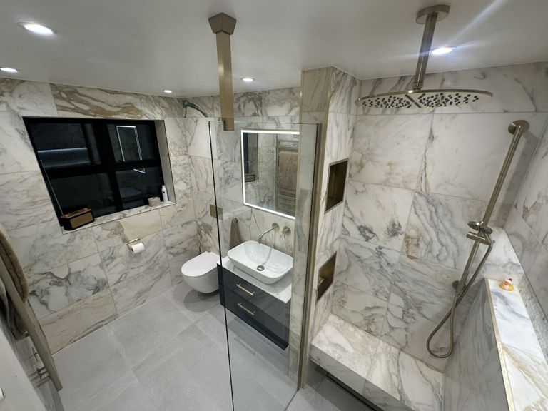 Roper Rhodes vanity with vessel basin and HiB Vanquish mirror in Chelmsford CM3 honed marble ensuite