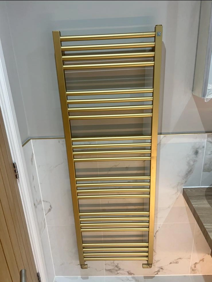 Brushed brass Crosswater towel radiator luxury ensuite Copford Green CO6 Essex Bowman Bathrooms installation