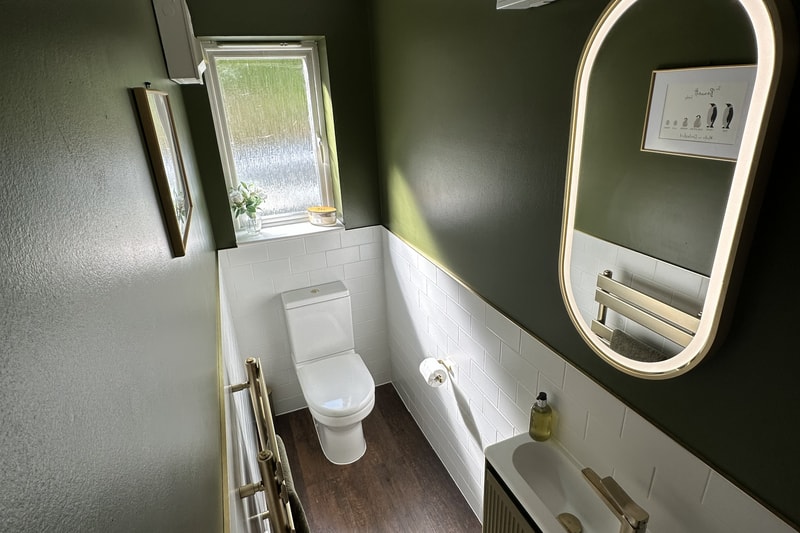 Luxury cloakroom with designer fixtures