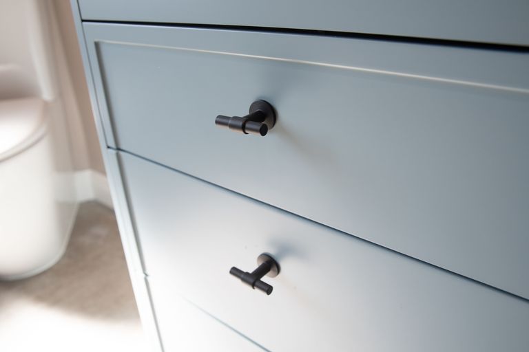 Roper Rhodes Toledo black T-bar handles close-up on Concierge vanity drawers in Coniston Blue Great Saling CM7