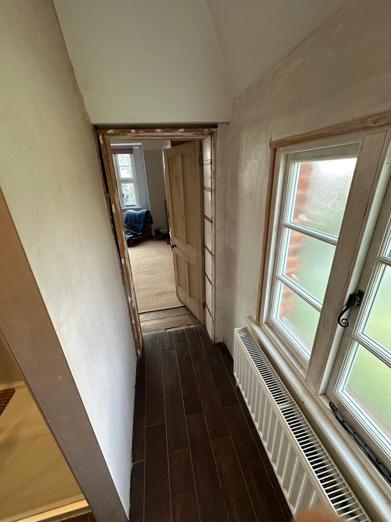 Hallway entrance to bathroom before renovation heritage rectory Great Saling CM7