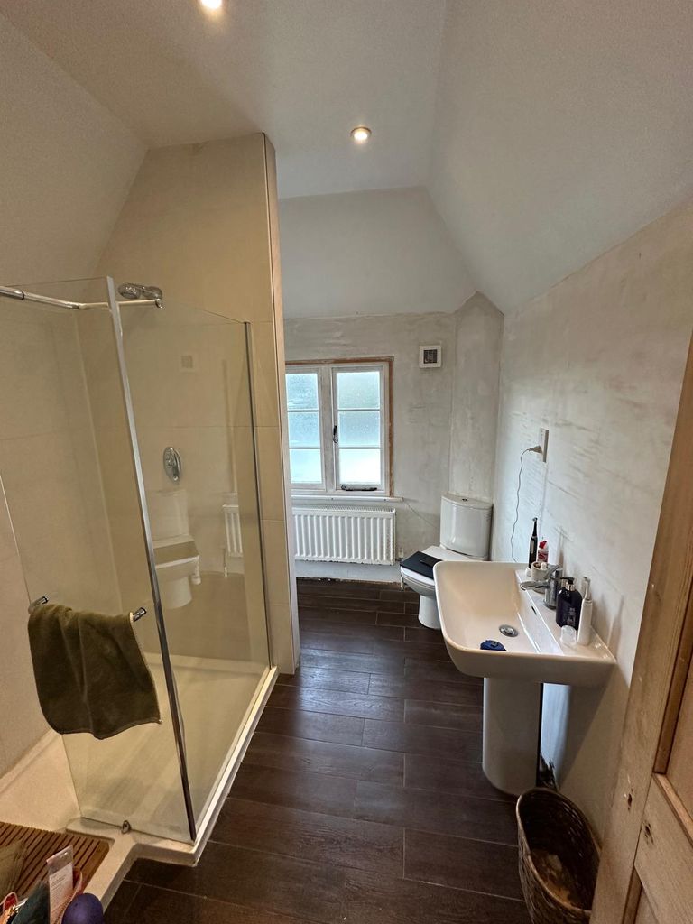 Old shower enclosure and pedestal basin before renovation Grade 2 listed rectory Great Saling CM7