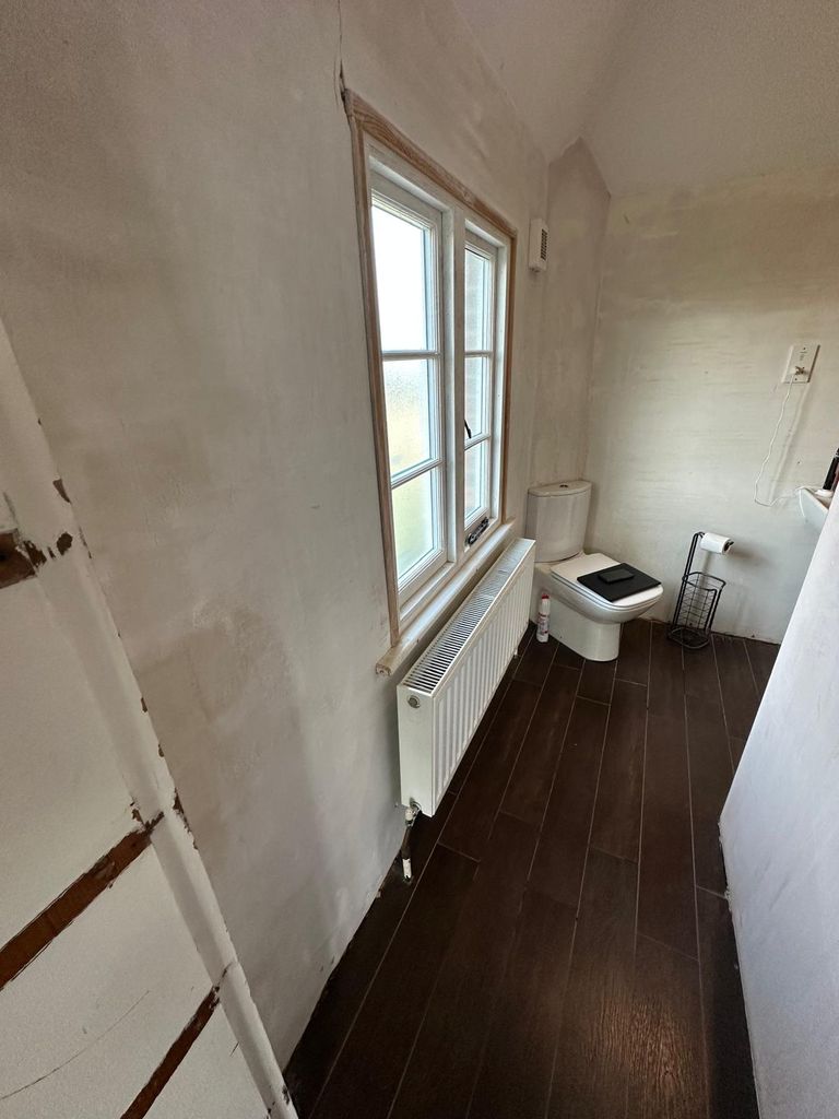 Toilet and window wall before renovation heritage rectory Great Saling CM7