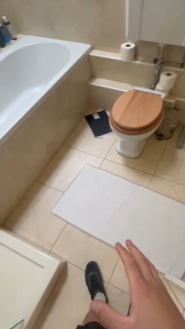 Old floor tiles before wetroom installation Halstead CO9