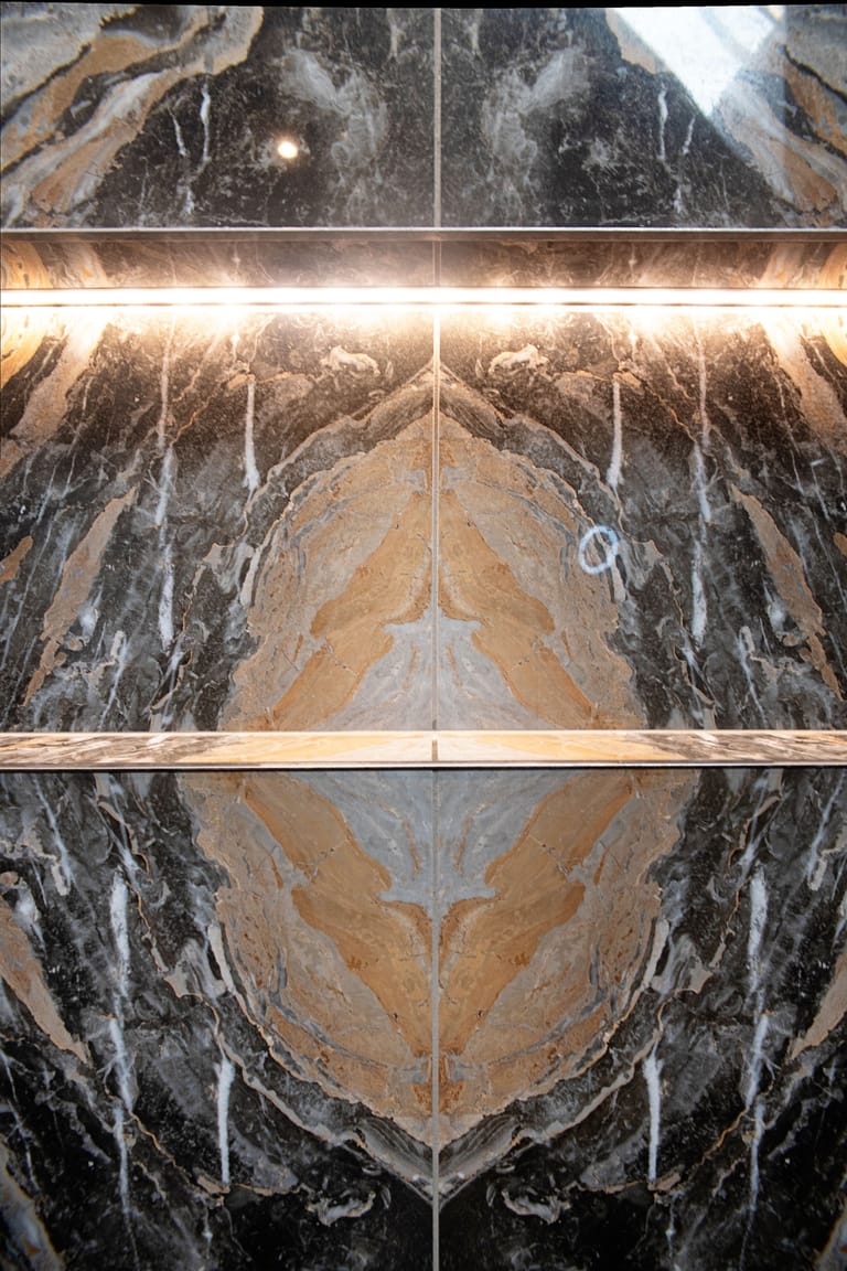 Master ensuite spa features with infinity niche warm white recessed lighting - Halstead Essex Bowman Bathrooms