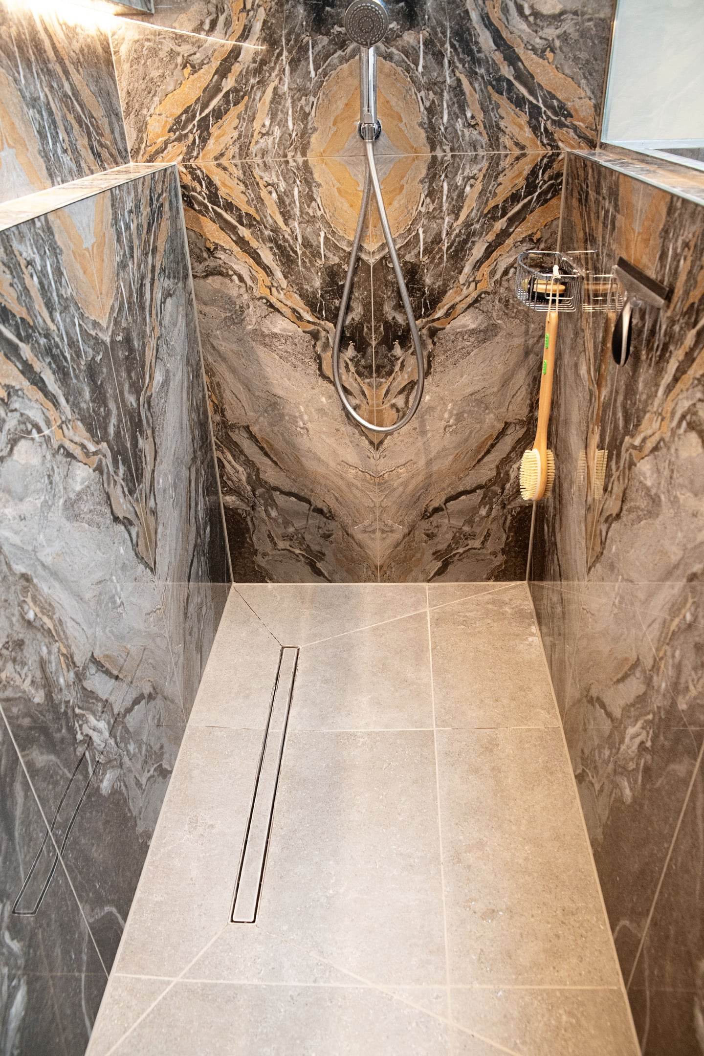 Slim linear waste drain set into the tiled wet-room floor, Halstead CO9 master ensuite