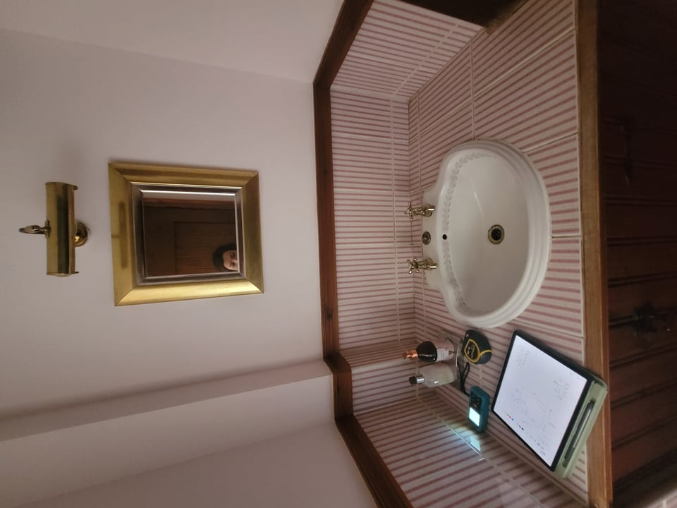 Original compact space Hatfield Peverel CM3 showing plain walls before bold cloakroom design