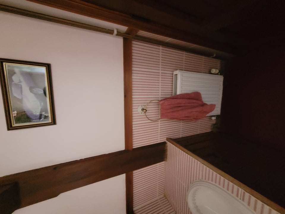 Original washbasin area Hatfield Peverel CM3 showing plain sink and basic fittings before renovation