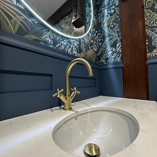 Cloakroom luxury finishes with premium materials and sophisticated styling - Essex Bowman Bathrooms