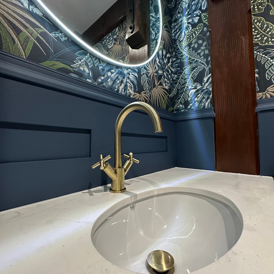 JTP Solex brushed brass basin mixer close-up with undermount oval basin and white countertop Hatfield Peverel CM3