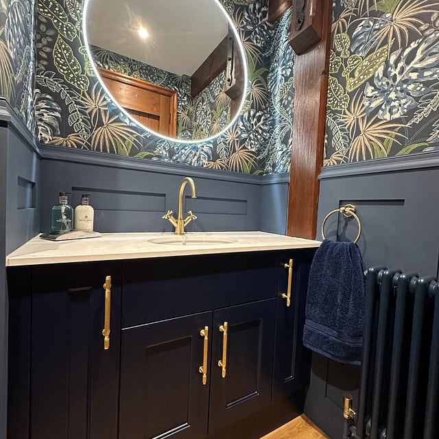 Navy cloakroom vanity with JTP brassware, HiB mirror and Vogue radiator in Hatfield Peverel CM3