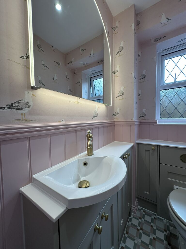 Traditional basin with JTP Grosvenor brushed brass lever mixer on a white worktop Kelvedon CO5 Essex