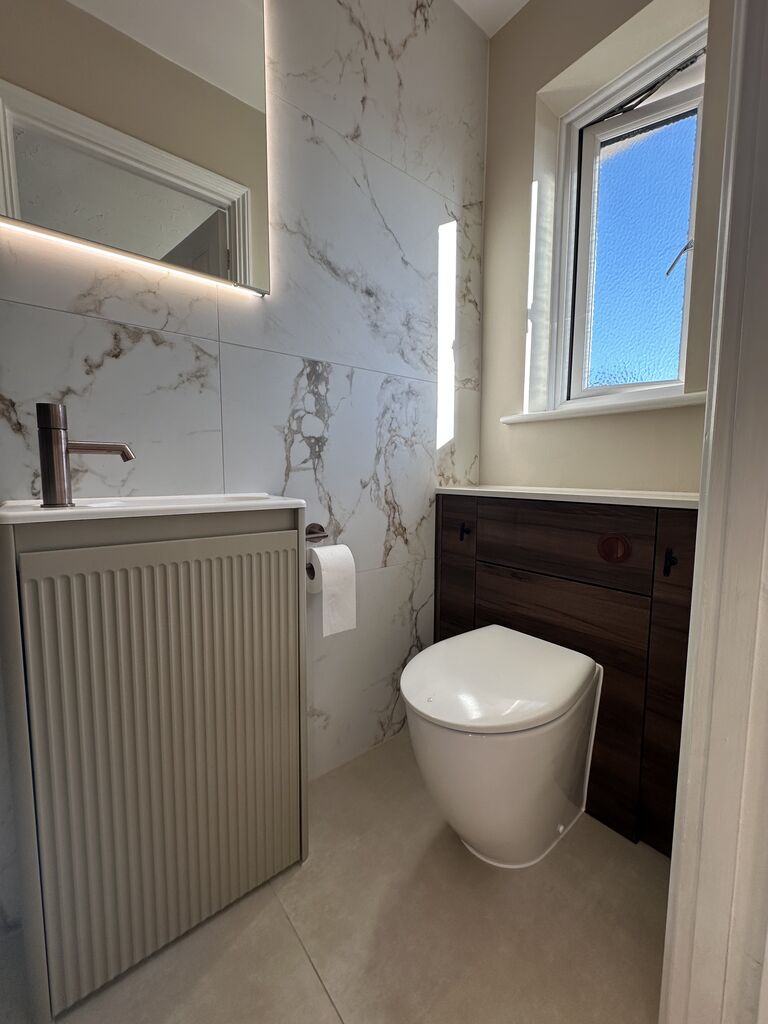 Fluted basin unit with bronze tap and WC with walnut cistern unit Kelvedon CO5 Essex
