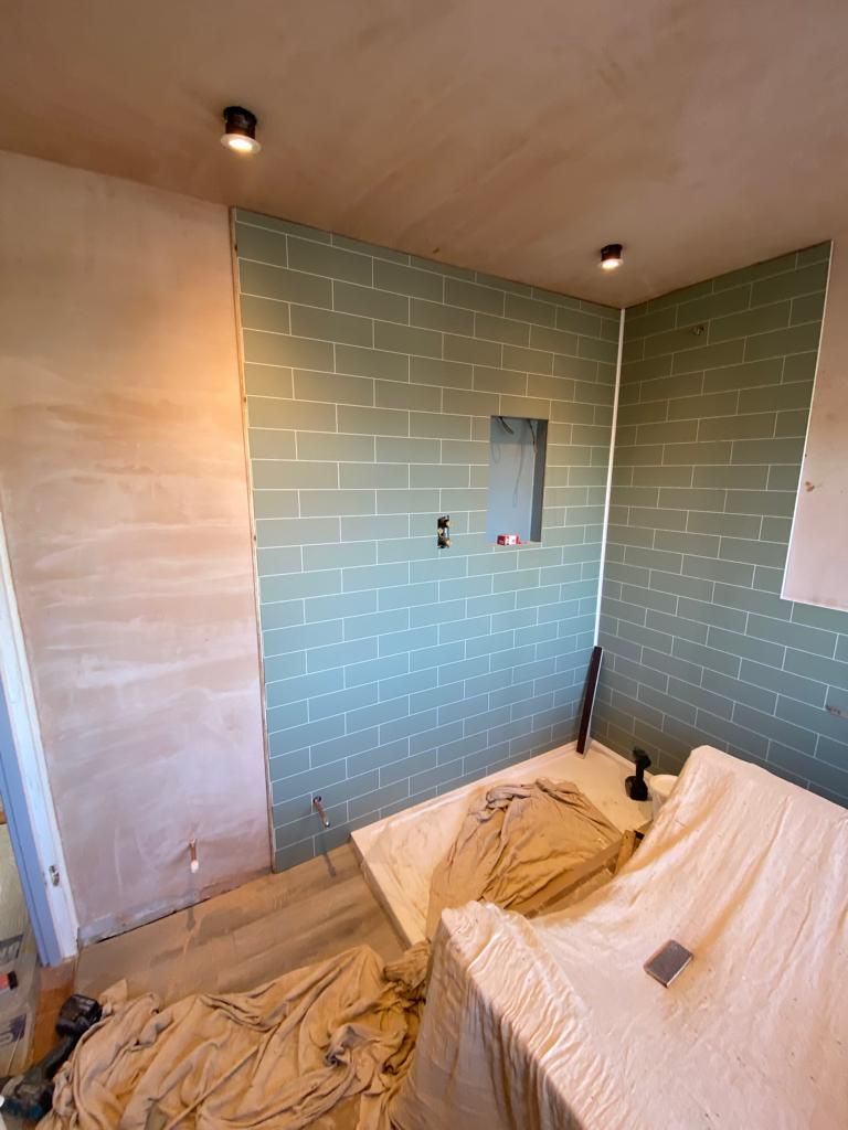 Amtico flooring being installed during bathroom renovation West Mersea CO5