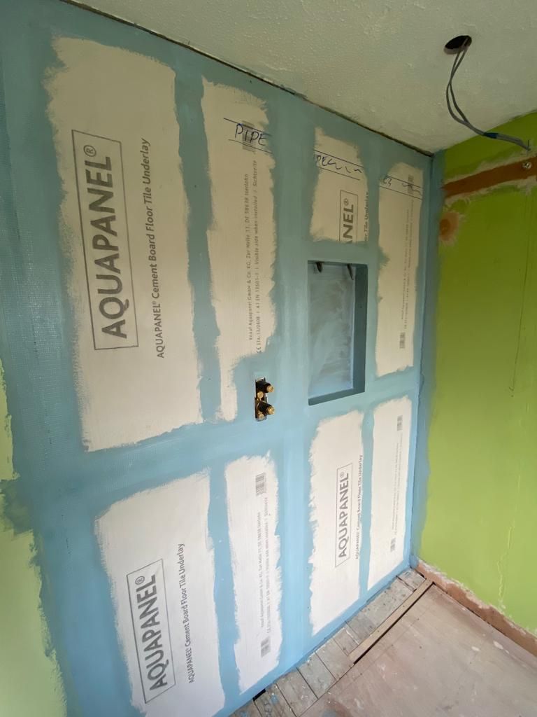 JTP designer radiator being fitted during bathroom renovation West Mersea CO5