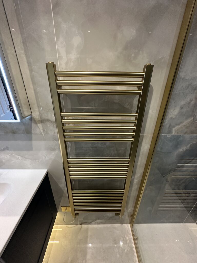 JTP VOS brushed brass ladder towel radiator on dual fuel Wickham Bishops CM8 Essex ensuite