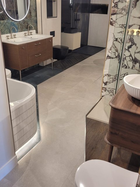 Designer vanity unit settings with twin basins and wall-hung WC at the Leigh-on-Sea showroom